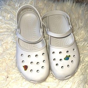 These are white crocs made in Canada still in good condition.